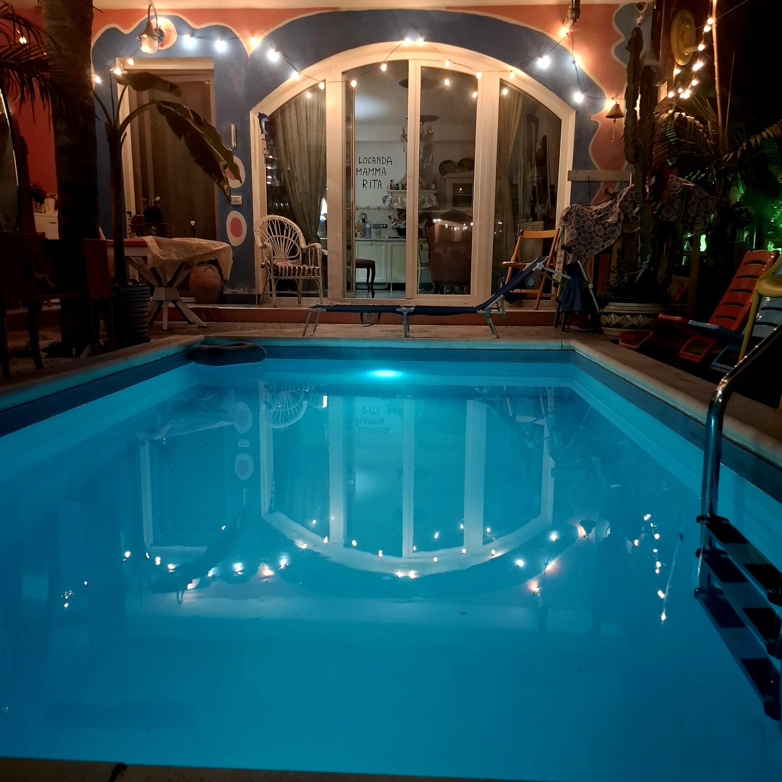Private pool surrounded by gardens at Casa Carolina